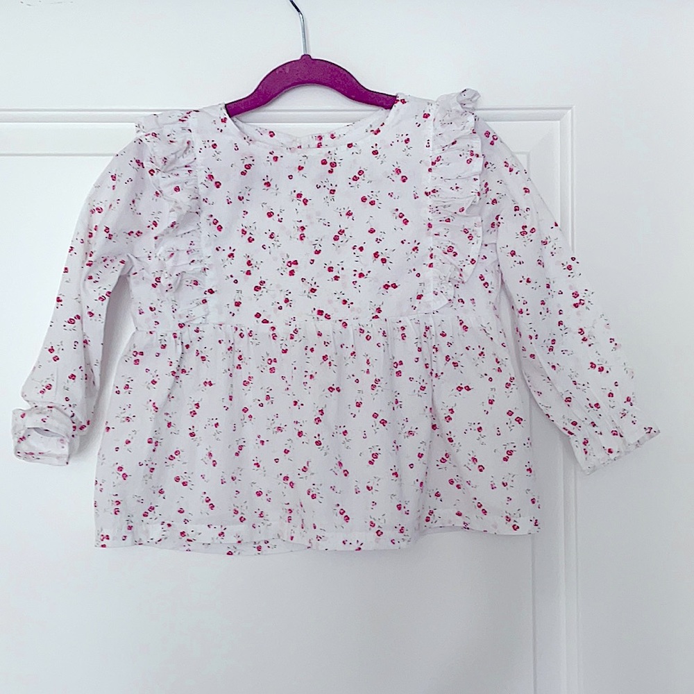 Knotted Fern floral peplum top size 6